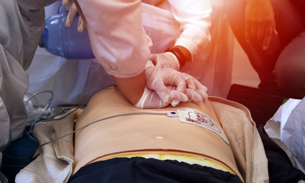 Emergency and first aid class on cpr doll, Cardiac life support